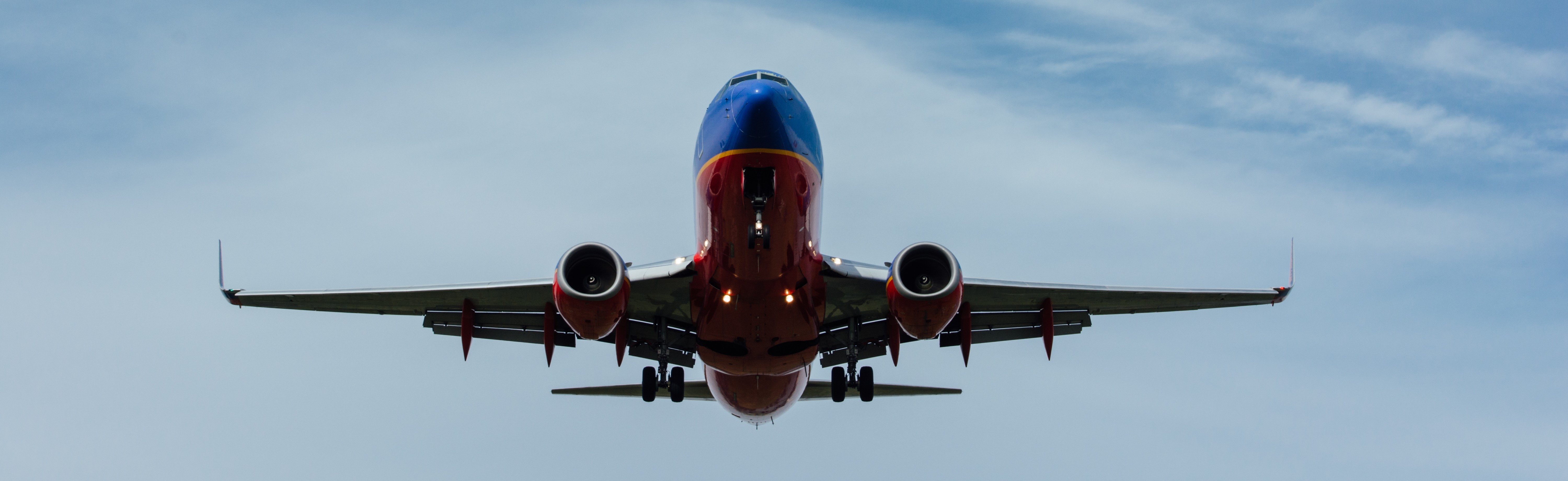 A commercial airline plane landing at an airport