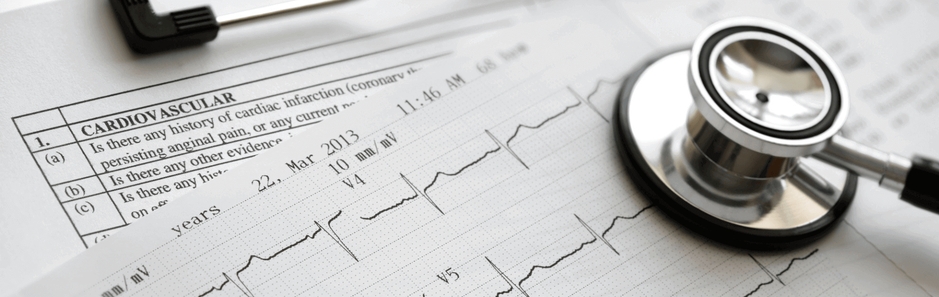 Stethoscope on top of medical records