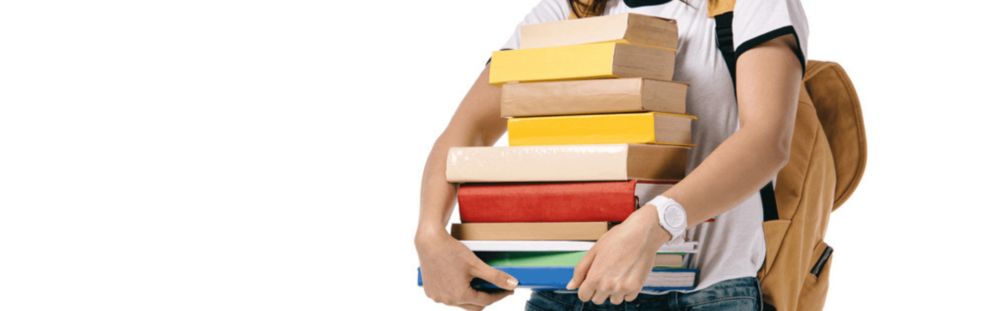Psychology books Image of a female student holding a pile of books