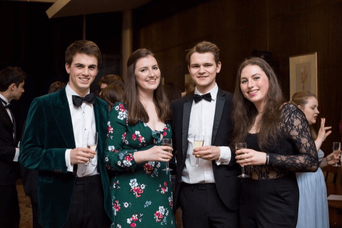 Cambridge MML students gathering at a formal hall day