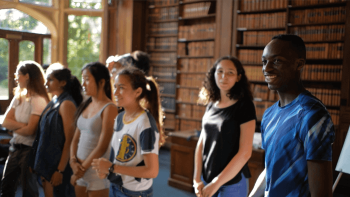 A group of students attending their orientation for summer school