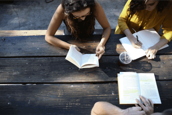 foreign students studying abroad together at a table