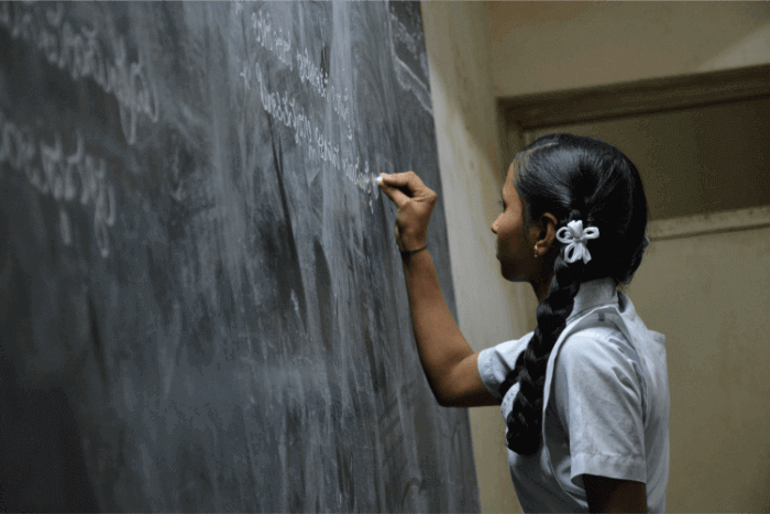 A young teen student volunteering for an educational charity and third-sector organisation