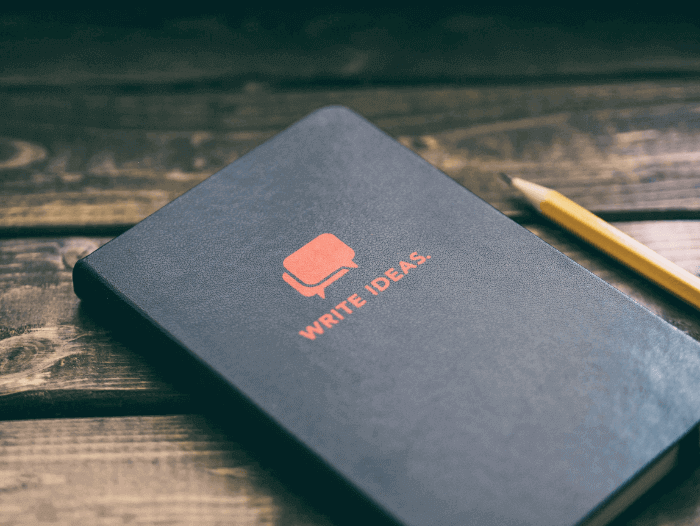 A notebook that says "write ideas"