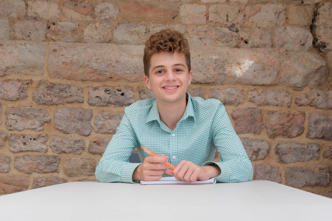 Young student smiling at the camera