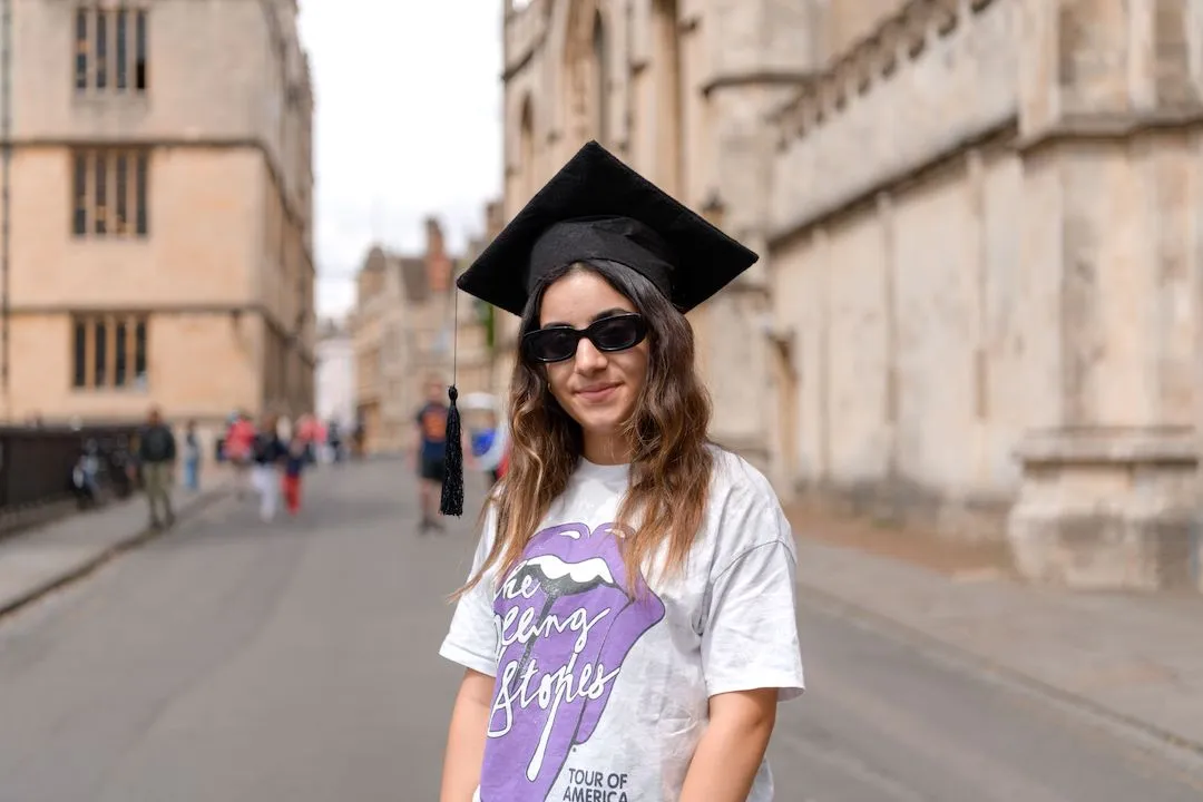 Oxford Scholastica summer school student wearing a graduation cap in Oxford