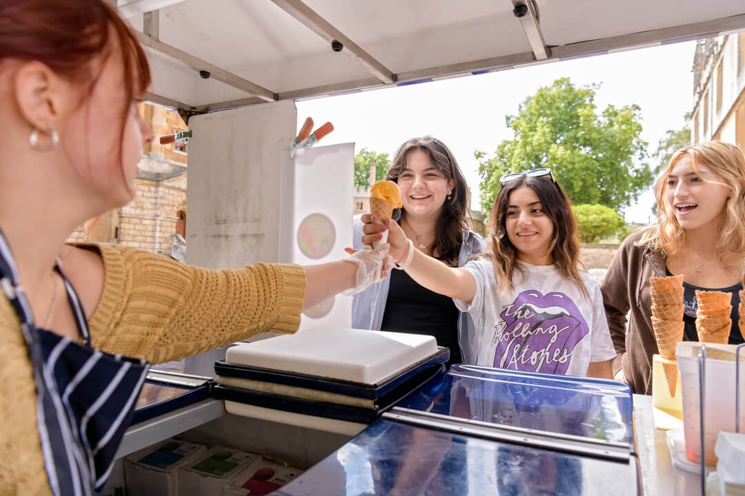 Oxford Scholastica Academy students getting ice cream together.