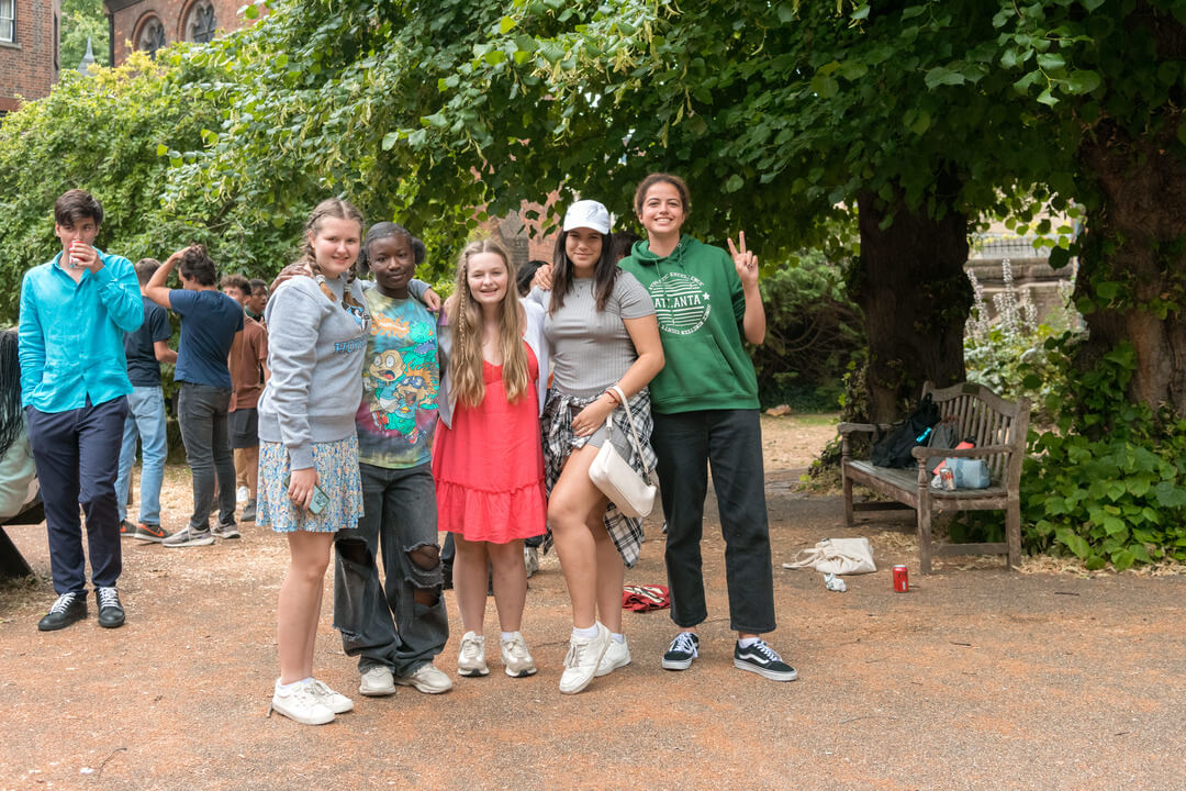 Oxford Scholastica Academy students smiling outside at a residential summer school.