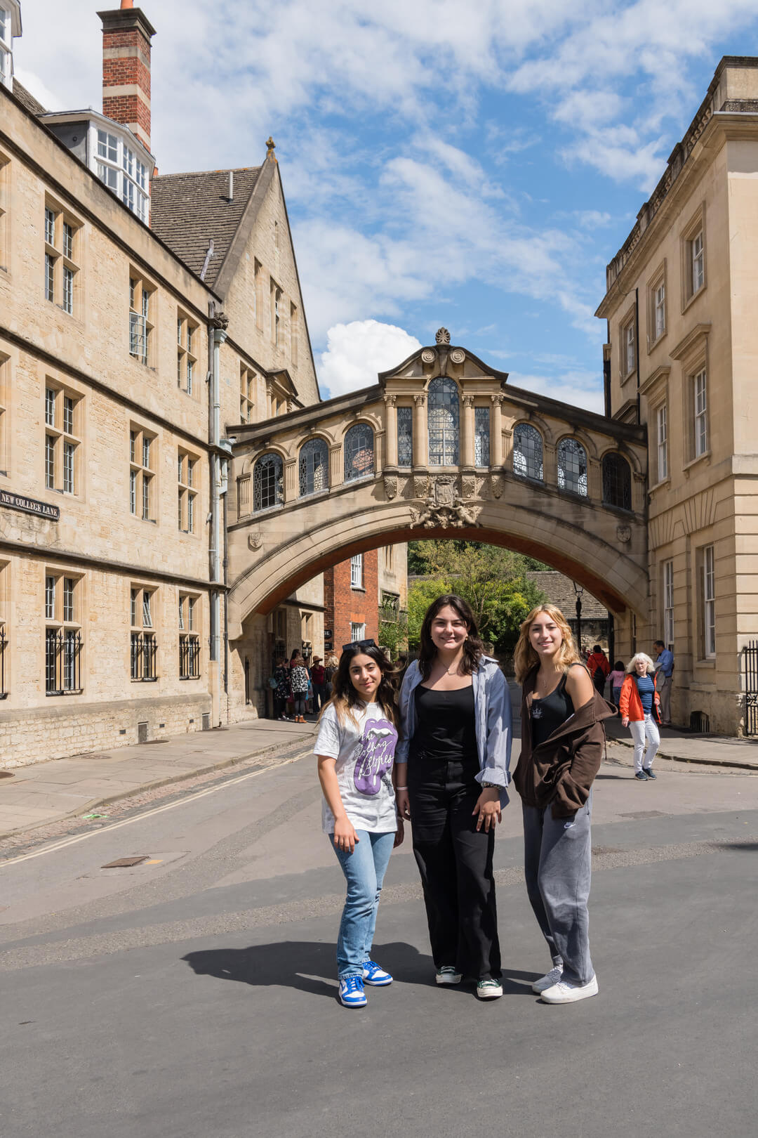 Three Oxford Scholastica Academy summer school students posing in front of the Bridge of Sighs.