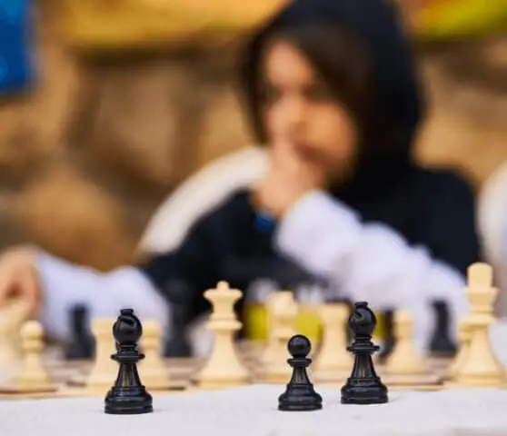 student playing chess