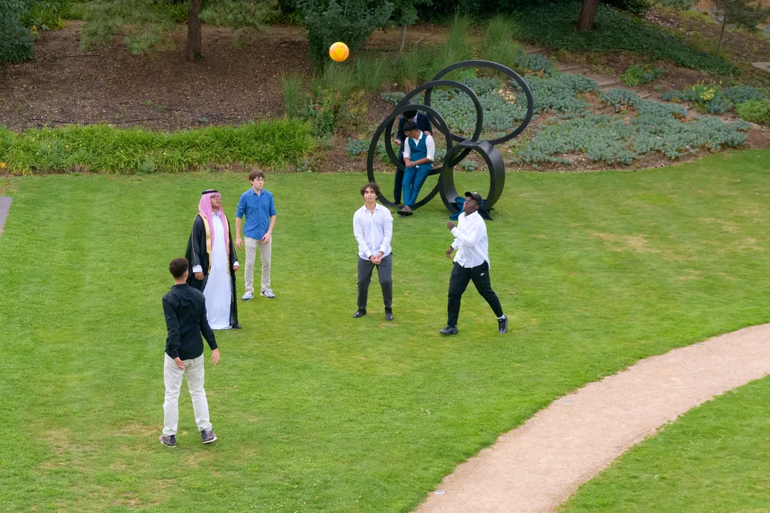 Group of Oxford Scholastica students playing with a ball