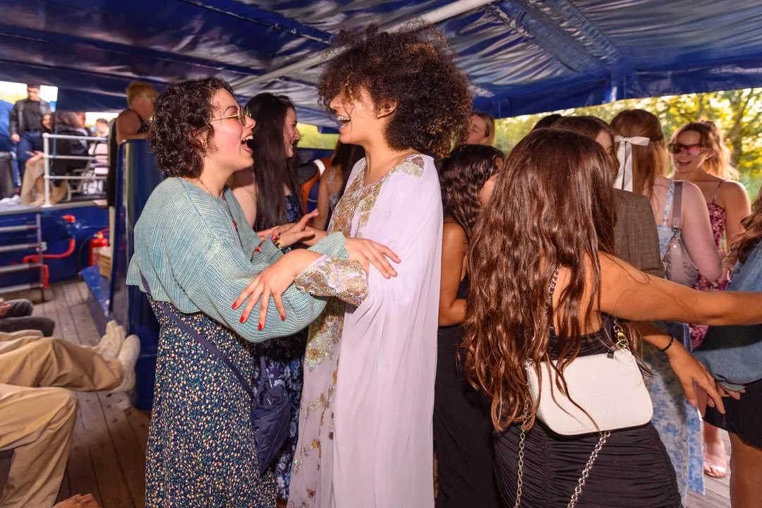 Two teens dancing together at Oxford Scholastica's boat ball