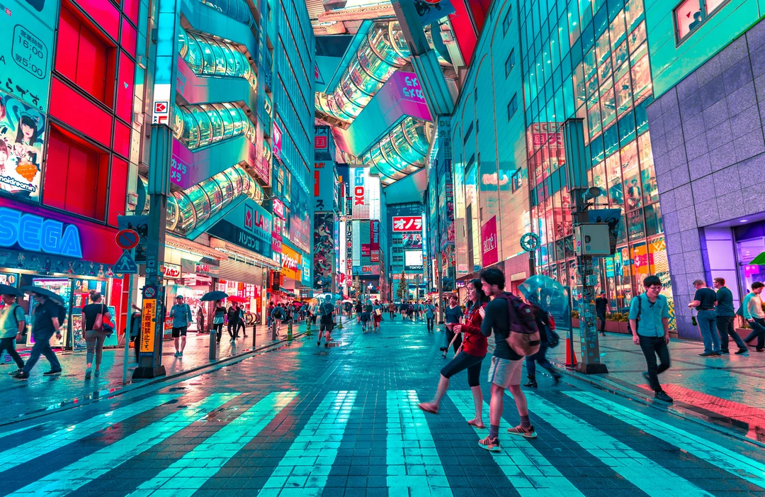 Street-level photo of a well-lit city street in Tokyo, Japan