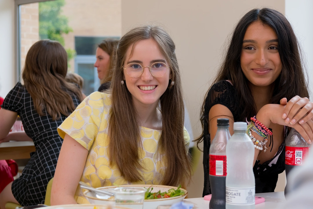 Two Oxford Scholastica students smiling at the camera