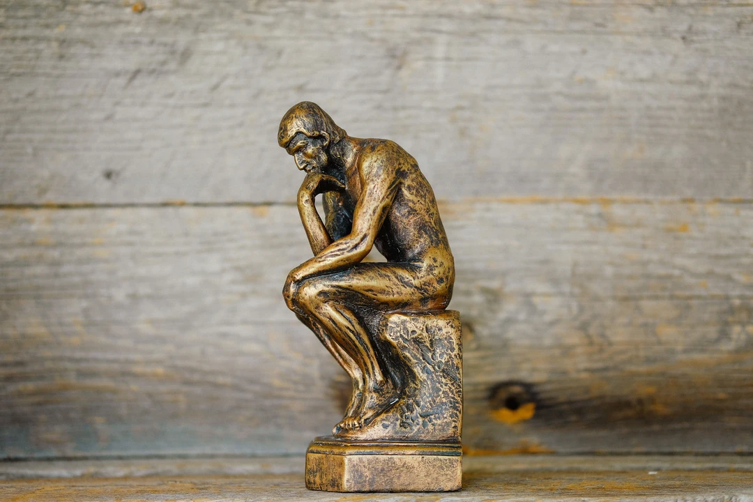 Small statue of a man thinking