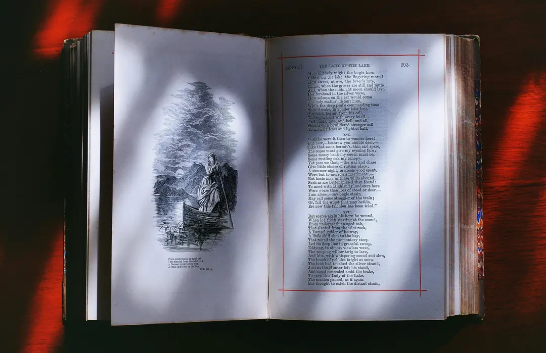 Open history book resting on a table