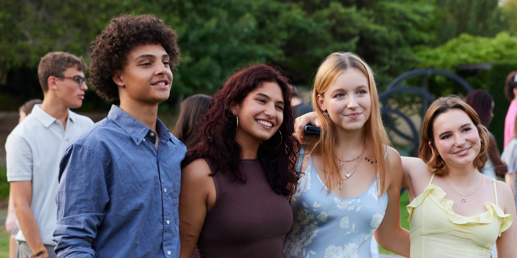 Four students smiling for a photo.